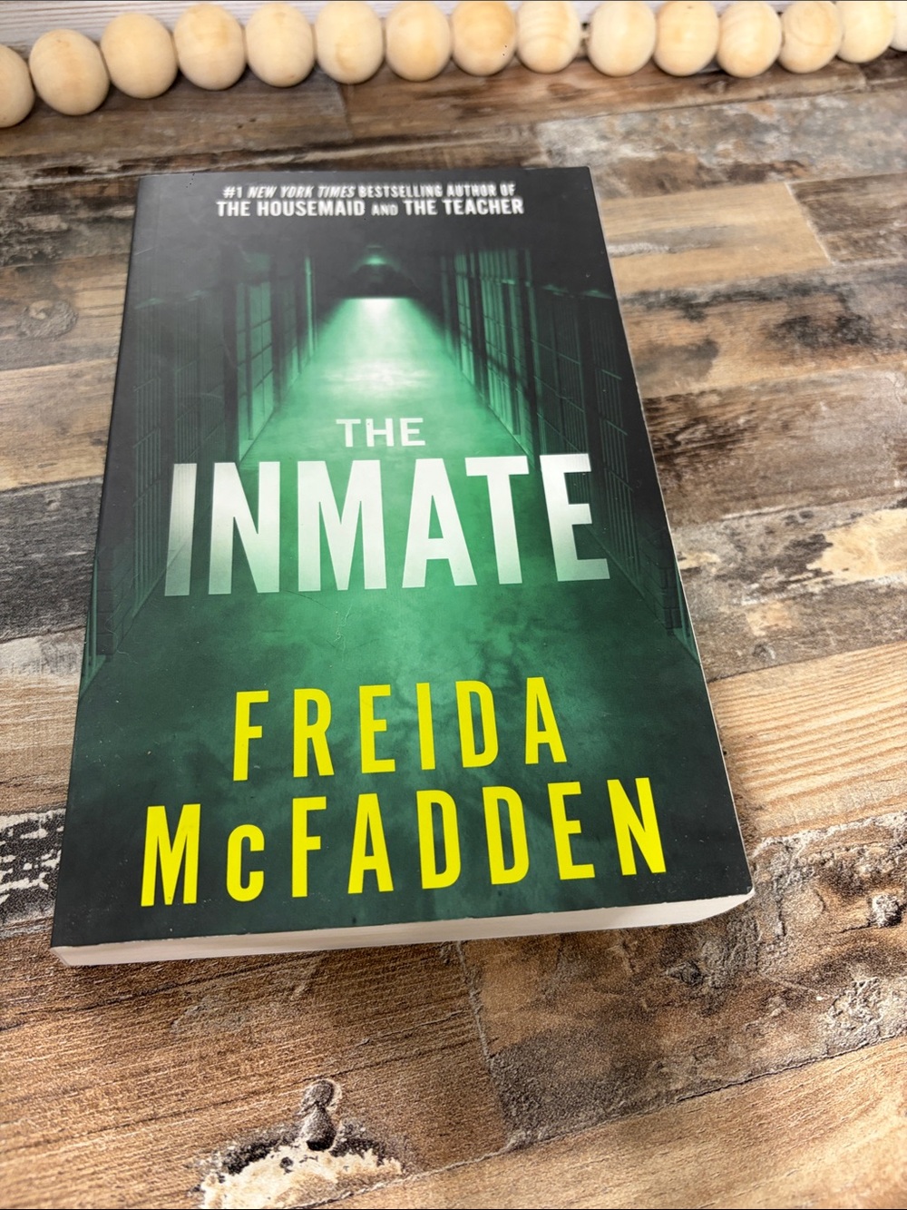 The Inmate by Freida McFadden - Green Cover Paperback